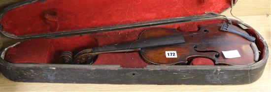 An old full sized violin in case with label